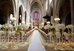 White aisle runner in grand Cathedral wedding.