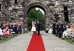 outdoor castle wedding with red aisle runner